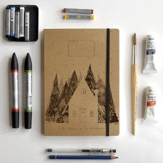 Notebook con casetta nel bosco 
