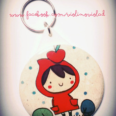 Portachiavi rotondo illustrato. cappuccetto rosso 