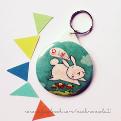 Portachiavi rotondo illustrato.coniglietto che saltella  be happy! 