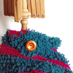 Collo in lana bouclé color verde smeraldo e fucsia 