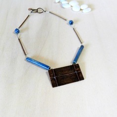 Collana in rame lavorato al foldforming ed elementi in ceramica artigianali 