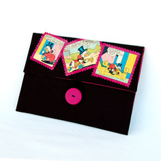 Pochette astuccio riciclo fumetti nero fucsia multicolore ecofriendly pop riuso tessuto accessori 