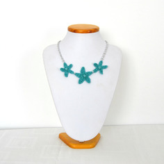 Preziosa collana girocollo turchese con stelle marine 
