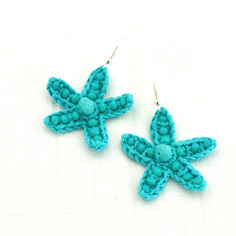 Preziosi orecchini pendenti a forma di stella marina 