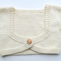 Scaldacuore da bambina in merino bianco naturale 